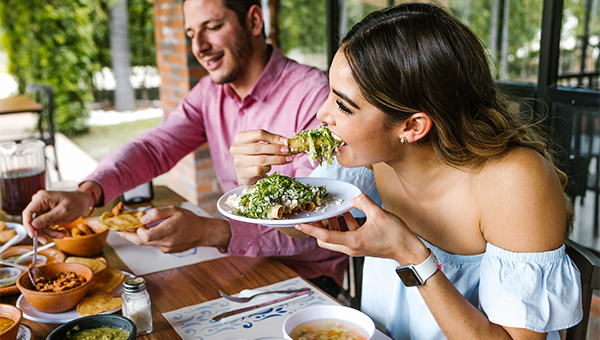 About Gexa Woman Eating Tacos