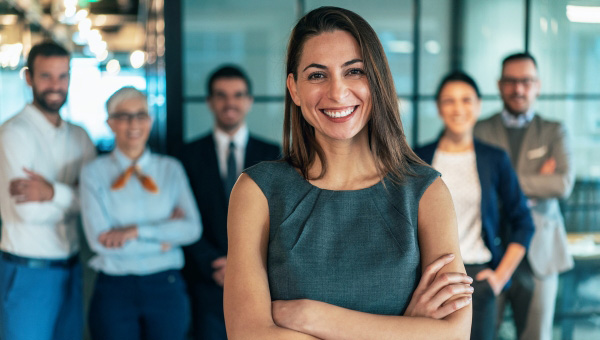 Woman leading team standing