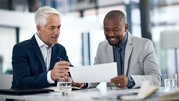 Men reviewing documents