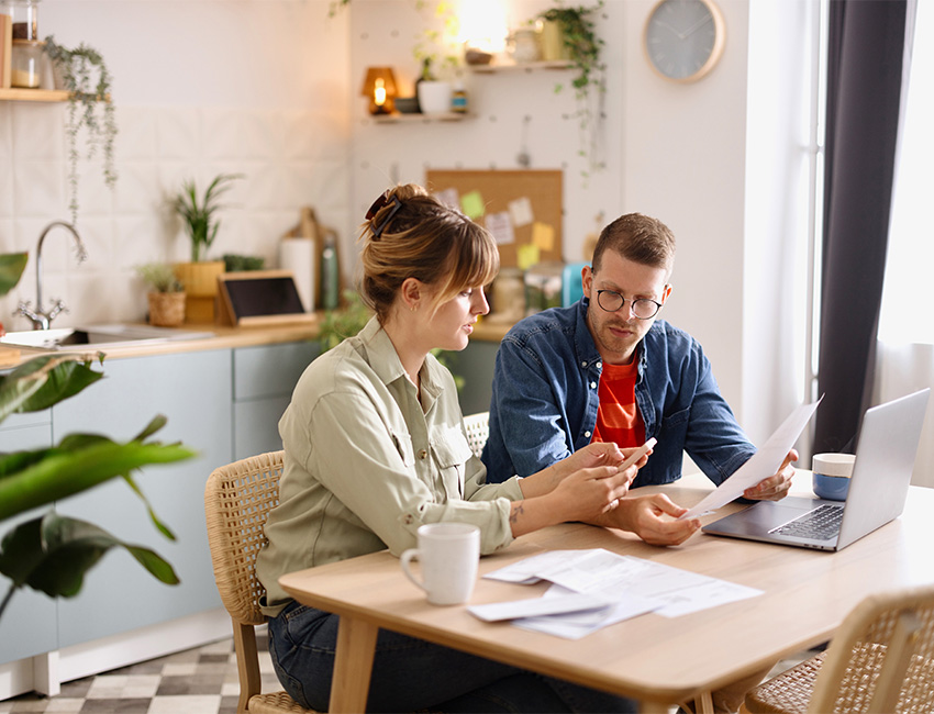 Couple reviewing bills