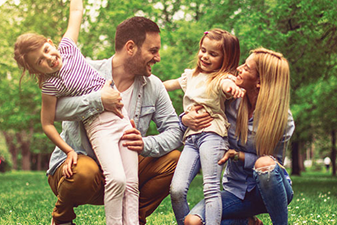 Family of four in nature