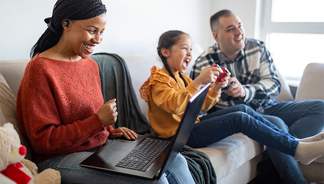 family laughing couch