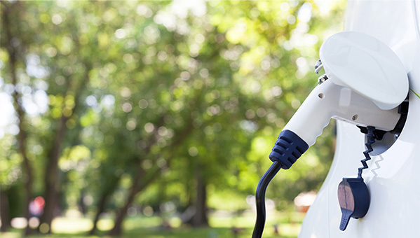EV charging white car