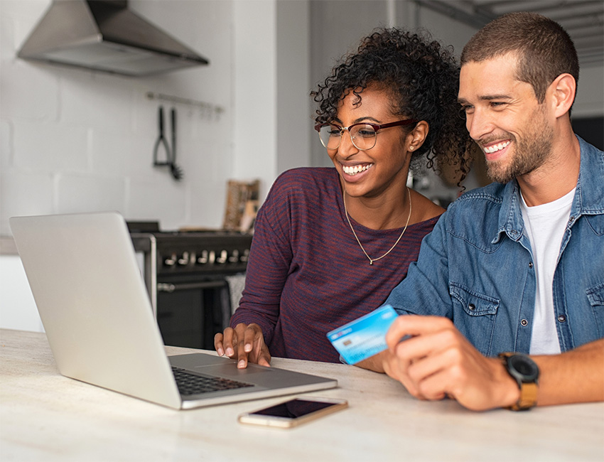 Couple paying bill at counter