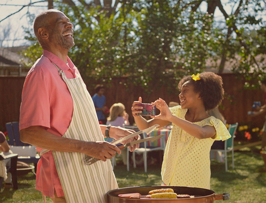 Happy couple checking phone