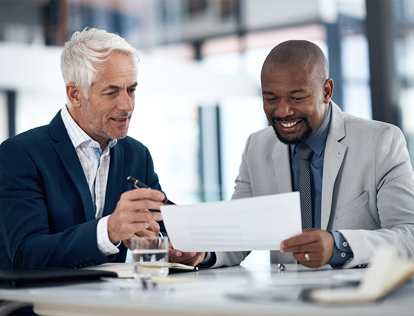 Men reviewing documents