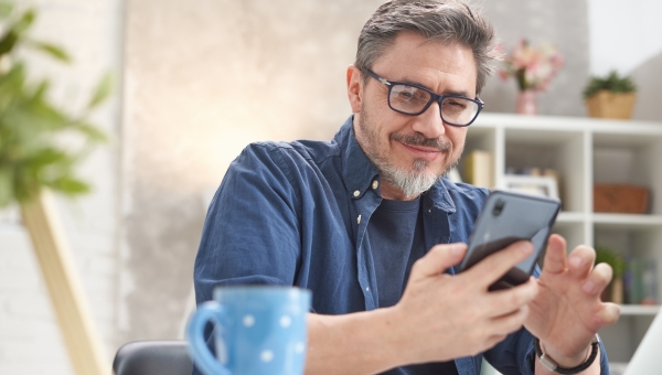 Smart Device Plans Man with Phone