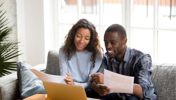 How to Read Your Bill Couple Reviewing