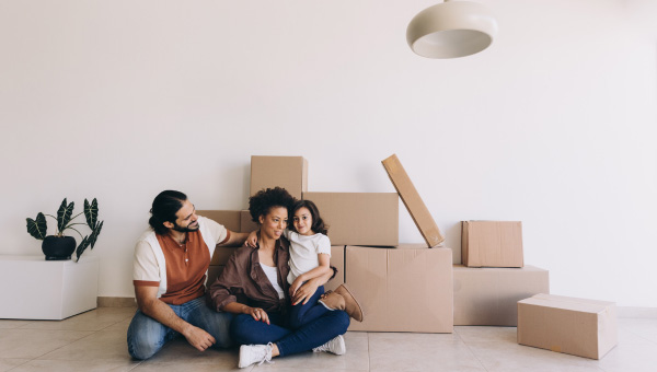 Family with moving boxes