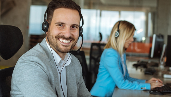 Call center man smiling