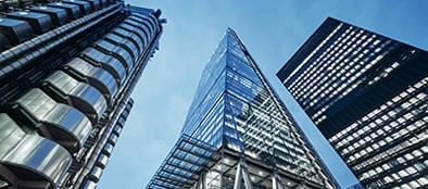 worms eye view of tall buildings on a clear day